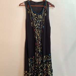 Dress or swimsuit cover.  100% Rayon Free size.